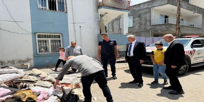 Başkan Hallaç, yangın mağduru aileyi yalnız bırakmadı